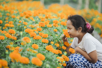 Close-up of girl with flowers