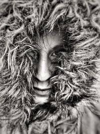 Close up portrait of woman wearing warm clothing