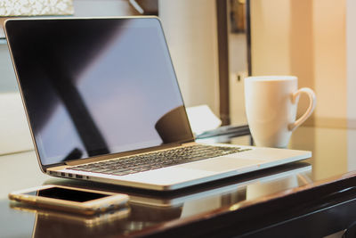 Coffee cup on table