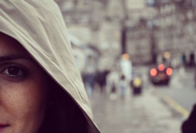 Close-up portrait of man in city