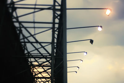 Low angle view of illuminated built structure against sky