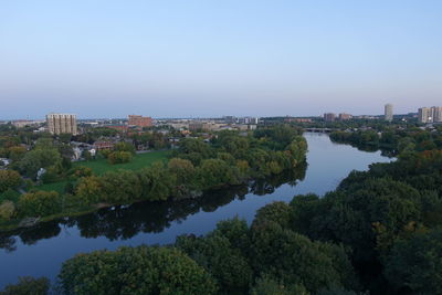 High angle view of trees and buildings against sky