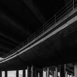 Low angle view of illuminated bridge in building