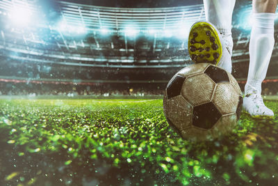 Close-up of soccer ball on field