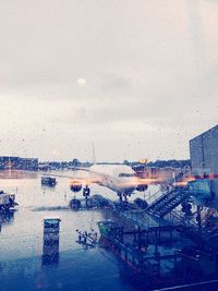 City seen through wet glass window