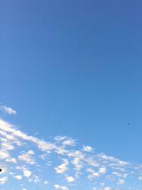 Low angle view of blue sky and clouds