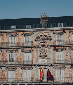 Facade of casa de la panaderia in plaza mayor, a major public space in the heart of madrid, spain.