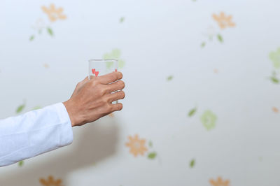 Close-up of man holding ice cream