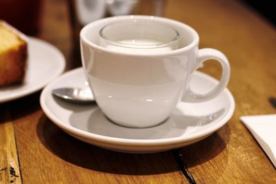 Close-up of coffee cup on table