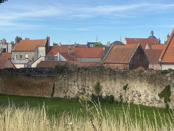 Buildings against sky