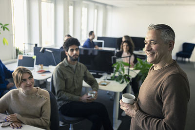 Group of business people having meeting in office