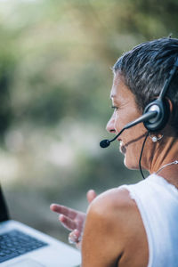 Portrait of man using mobile phone