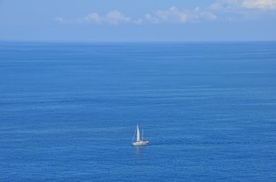 Boat sailing in sea