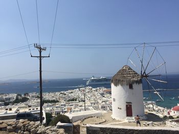 Panoramic view of buildings and sea against clear sky