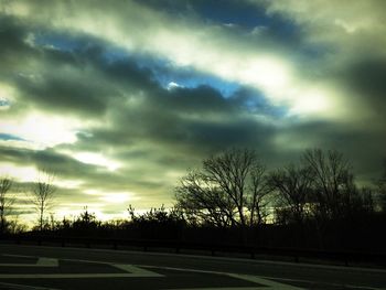 Scenic view of landscape against cloudy sky