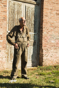 Senior adult man wearing working clothing