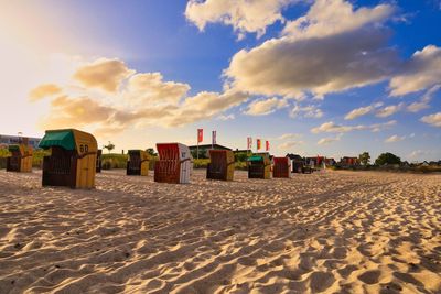 Panoramic view of beach against sky during sunset