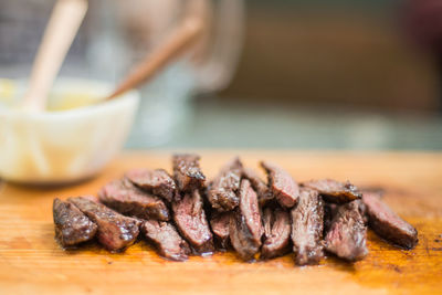 Close-up of meat on cutting board