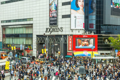 People walking on street in city