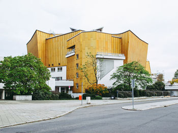View of yellow building against sky