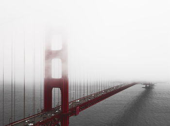 Suspension bridge in foggy weather