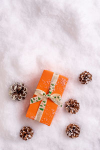 High angle view of christmas decoration on snow