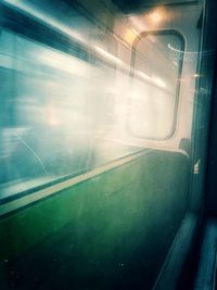 Railroad track seen through train windshield