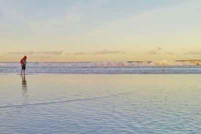 Scenic view of sea at sunset