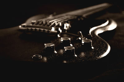 Close-up of guitar on table