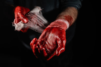 Cropped image of man holding food