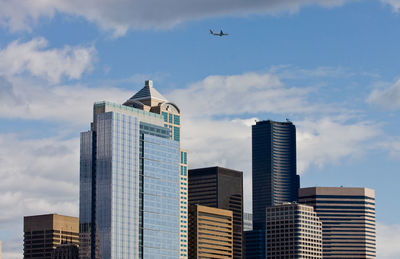 Low angle view of modern buildings against sky