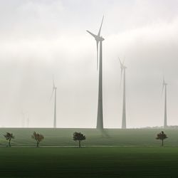 Wind turbines on field