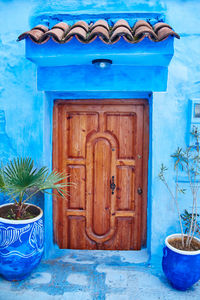 Close-up of closed blue door of building