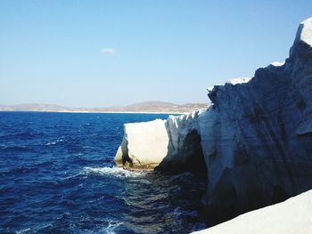 Scenic view of sea against blue sky