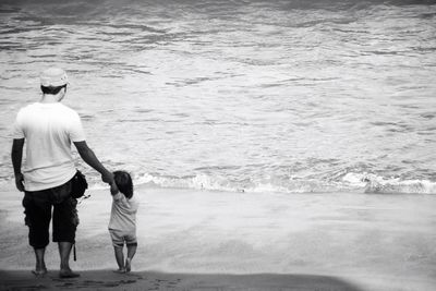 Woman standing on beach