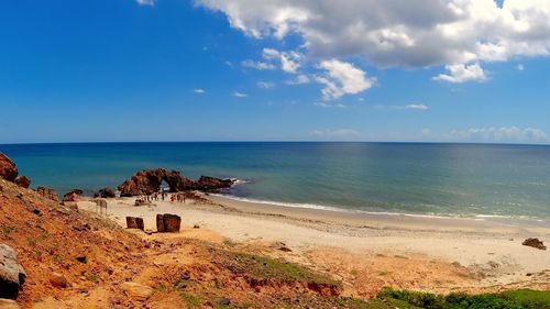 Scenic view of beach against sky