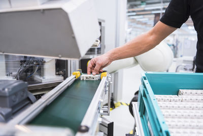 Hand holding product of assembly robot