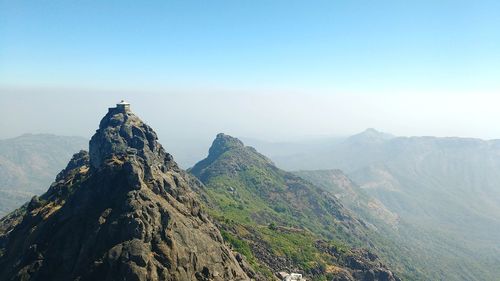 Scenic view of mountains against clear sky