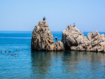 Scenic view of sea against clear sky