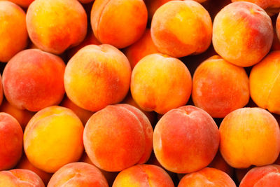 Full frame shot of peaches for sale at market