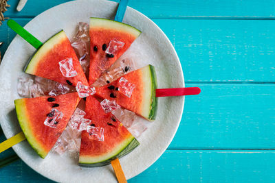 High angle view of fruits in plate on table