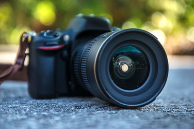 Close-up of camera on table