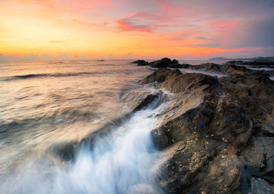 Scenic view of sea against sky during sunset