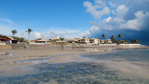 Scenic view of beach against sky