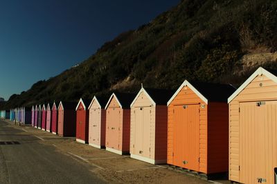 Colorful row houses by mountain