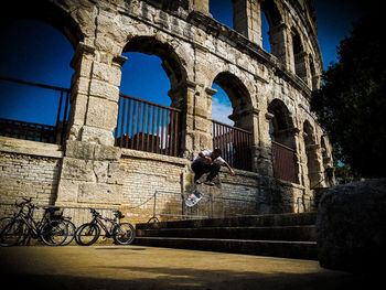 People at historical building