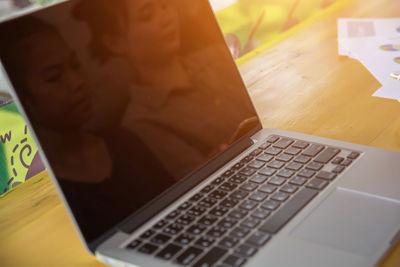 Close-up of laptop on table