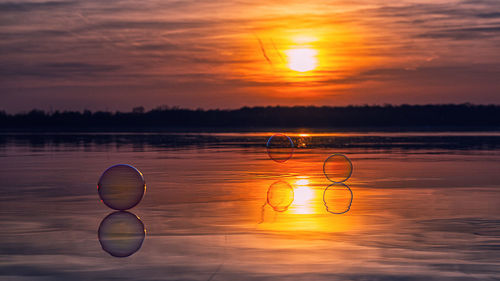 Scenic view of sunset over sea