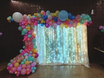 Multi colored balloons on floor