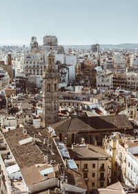 High angle view of buildings in city against clear sky